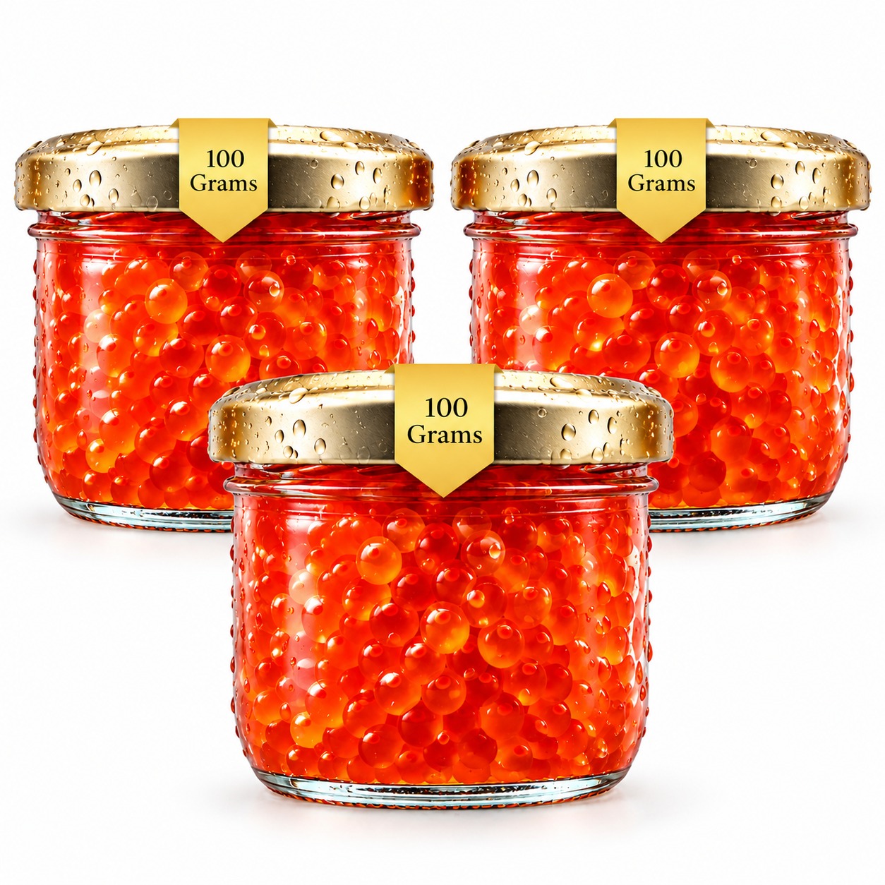 Œufs de saumon Black Almas aux grains orange brillants.